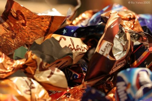 Operatives handling green waste and checking safety measures