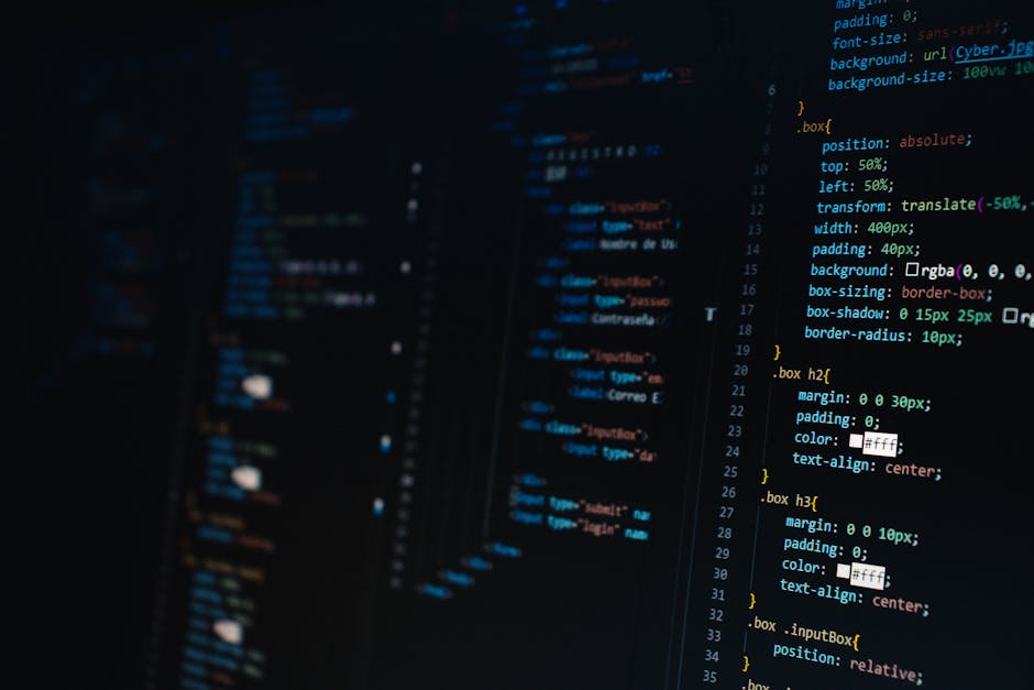 A close-up photograph of a computer screen displaying lines of CSS code with various colours indicating different style properties. The code includes properties such as margin, padding, border, box-sh